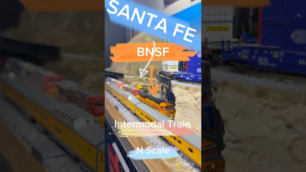 Watch the BNSF and Santa FE main line intermodal N scale train with DP climb the desert mountain